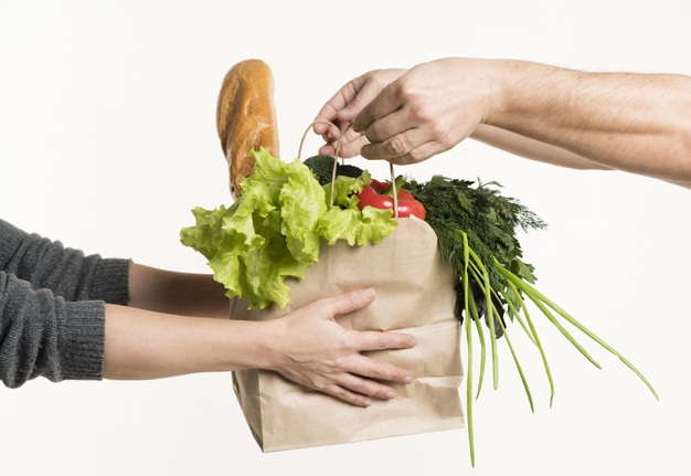 pair-hands-holding-grocery-bag_23-2148382371.jpg